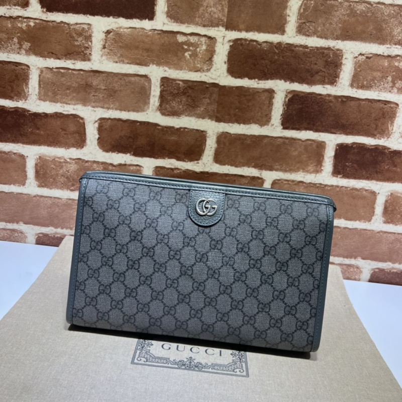 G*u*i clutch bags
